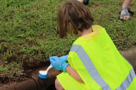 Girl working on stormwater project in Oklahoma