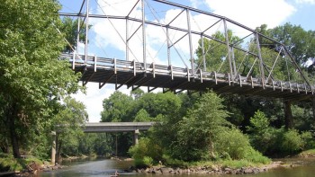 Camelback Bridge stretches over a river in North Carolina